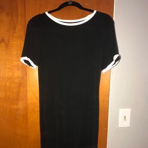 Casual black dress with white collar and sleeves.